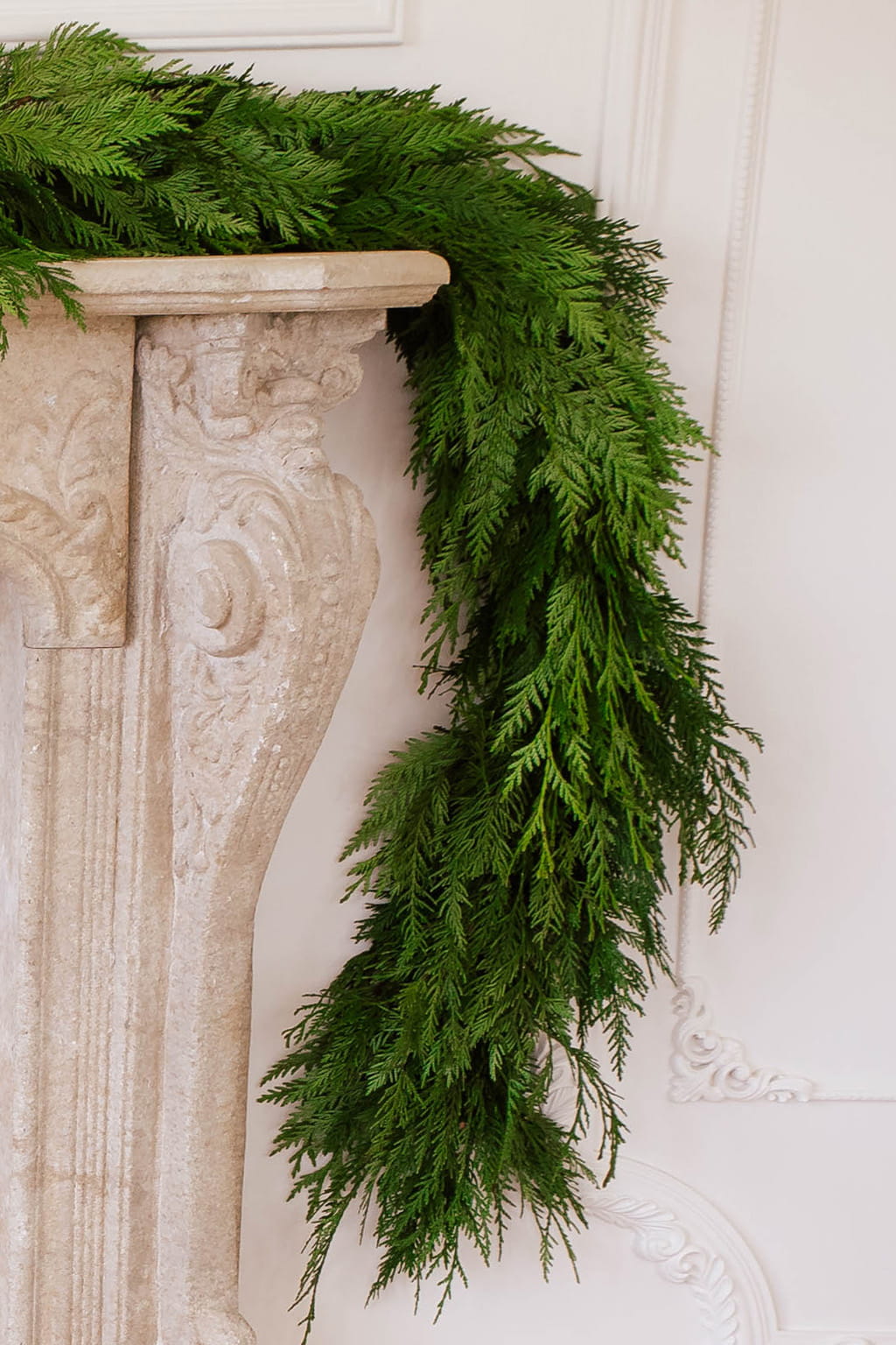 Cedar garland fresh greenery made with western red cedar available in 25 to 75 foot lengths for Christmas decor mantel and holiday decoration