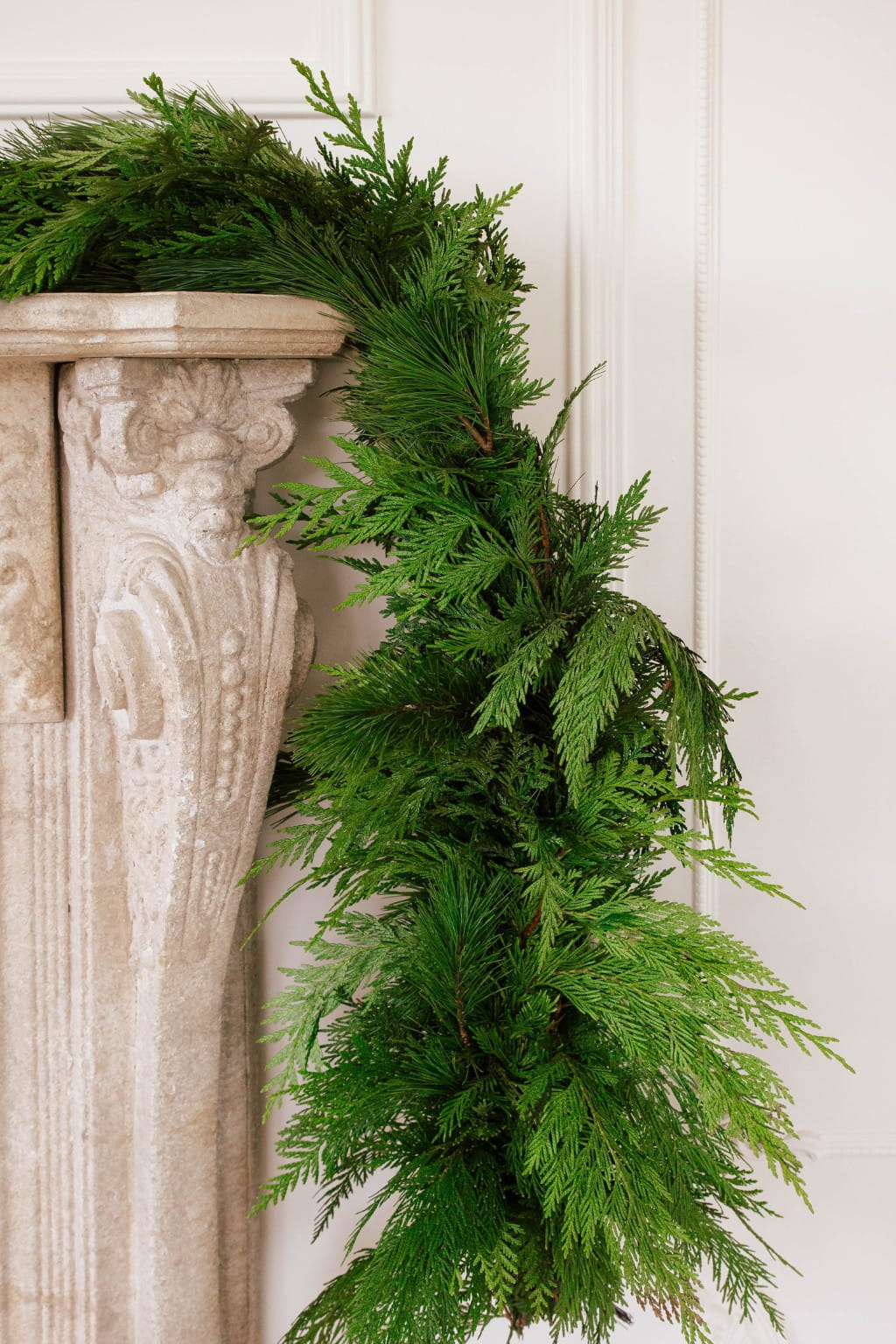 Favorite garland fresh greenery made with western red cedar and white pine available in 25 to 75 foot lengths for Christmas decor mantel and holiday decoration