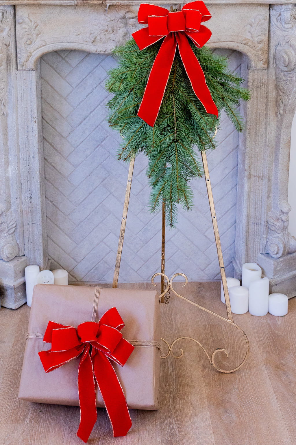 Red bow trimmed in gold with greenery swag wholesale 35 per box for Christmas decor front door and holiday decoration